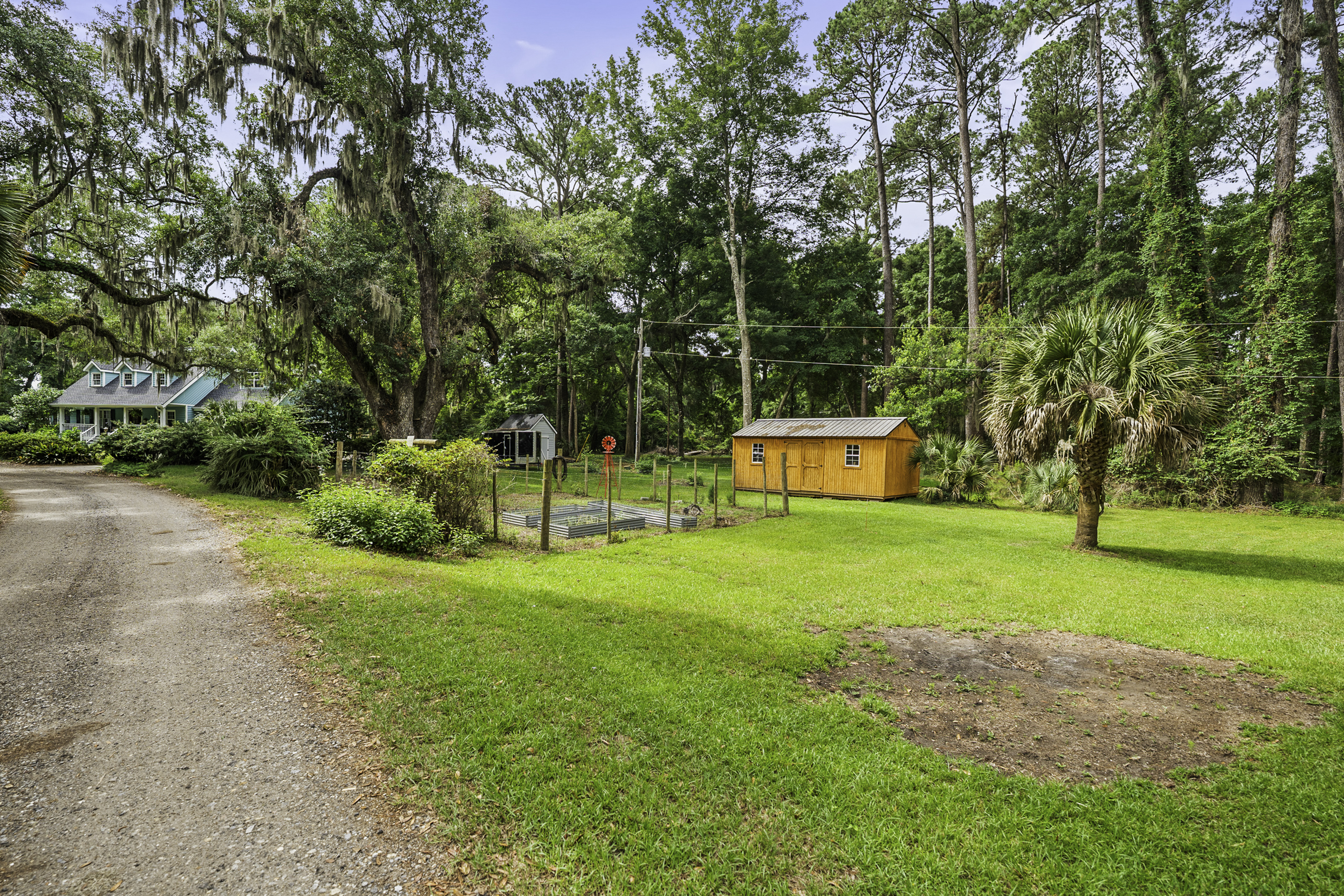 One of a kind, Lowcountry Living! This beautiful house sitting amongst – image 65