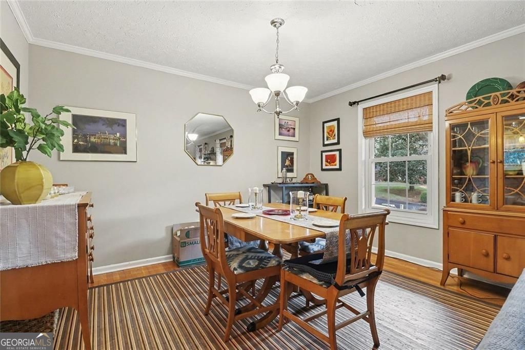 Beautifully updated and ideally located in the heart of Dunwoody, this – image 8