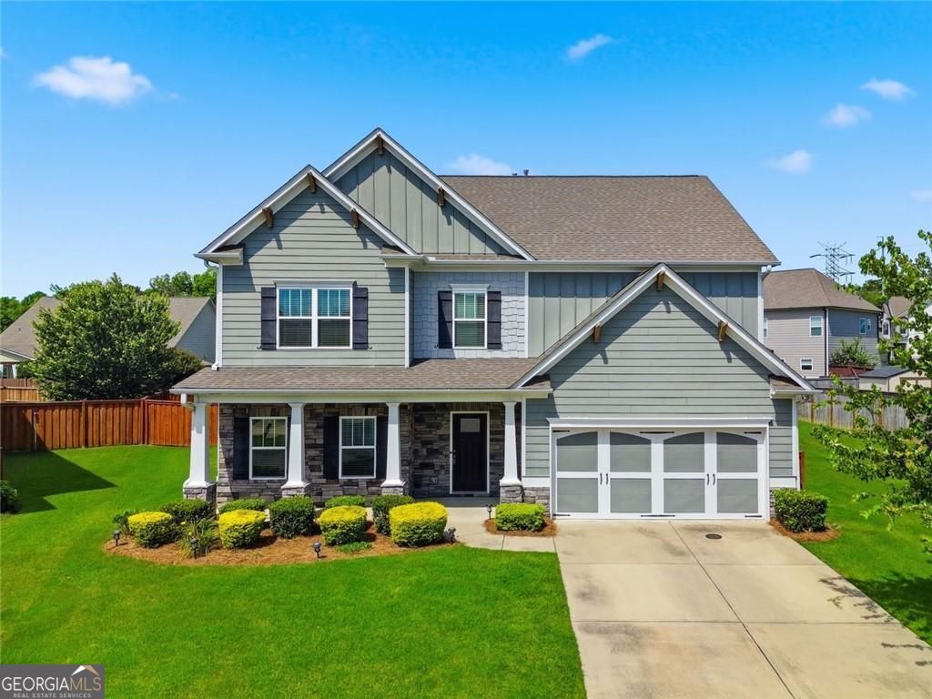 Flawlessly maintained and thoughtfully designed, this home exudes the – image 1