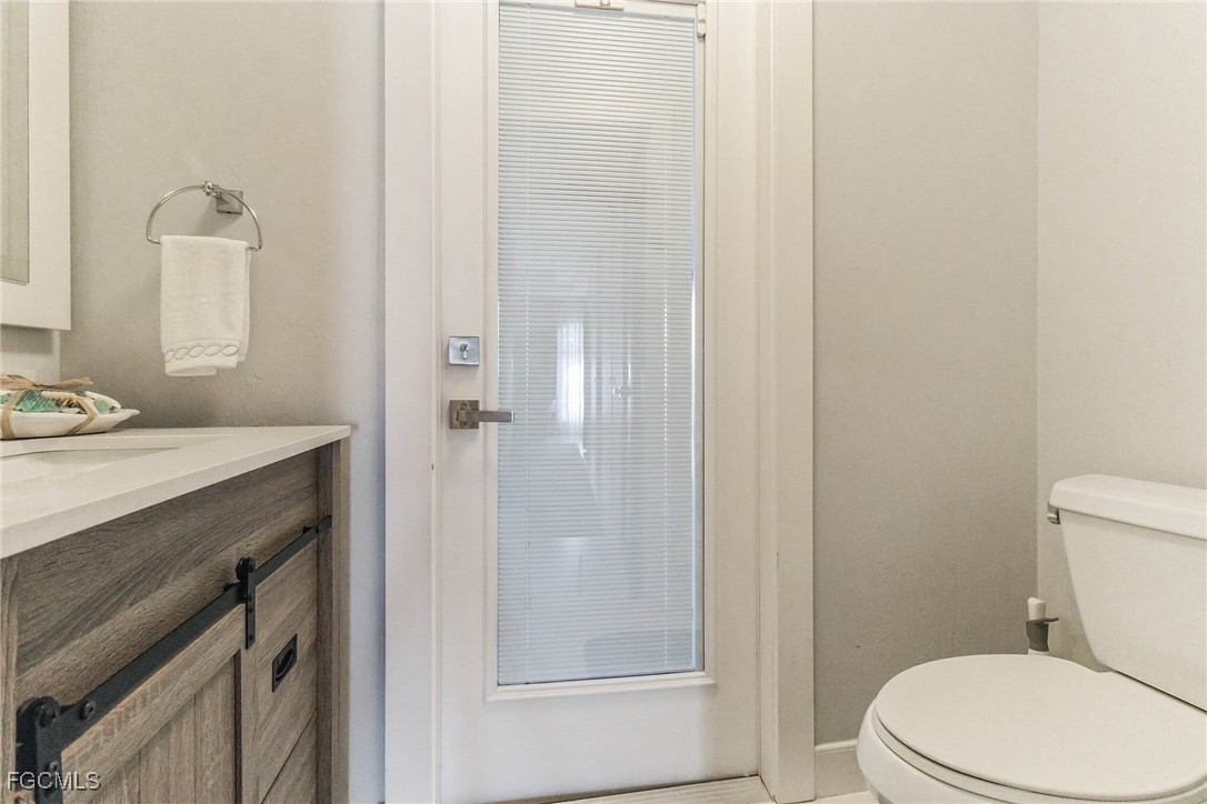 Welcome to your future GULF ACCESS HIDDEN GEM OF A home in the charmin – image 13