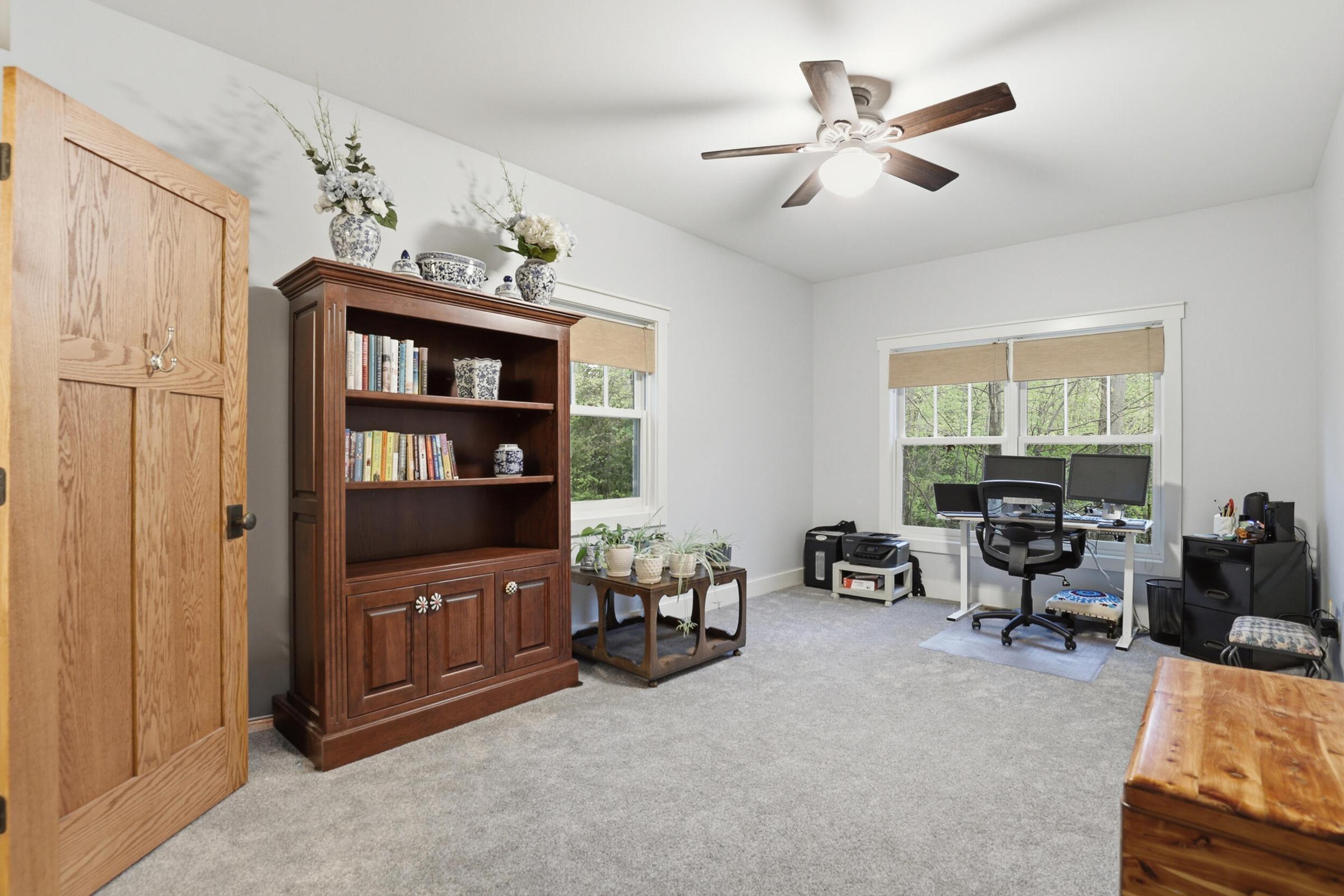 Tucked away on over an acre along the Little Muskegon River in the hea – image 30