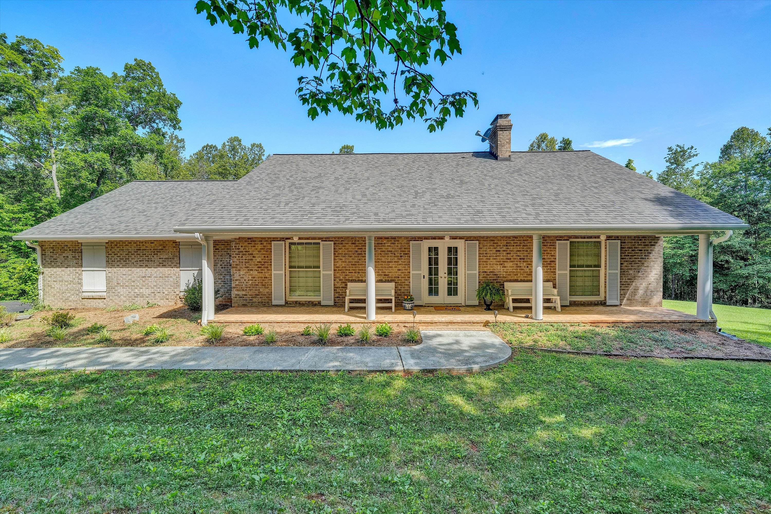 Custom-built and beautifully maintained, this 3-bedroom, 2-bath home o – image 1