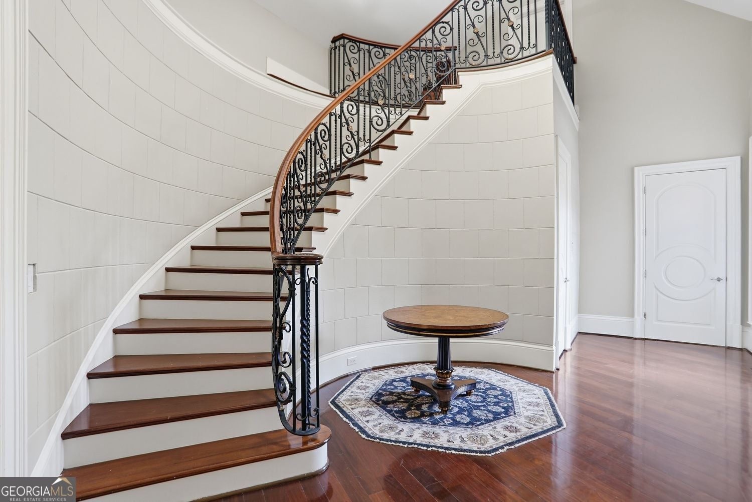Set on 3.8 beautifully manicured acres, this elegant gated estate offe – image 94