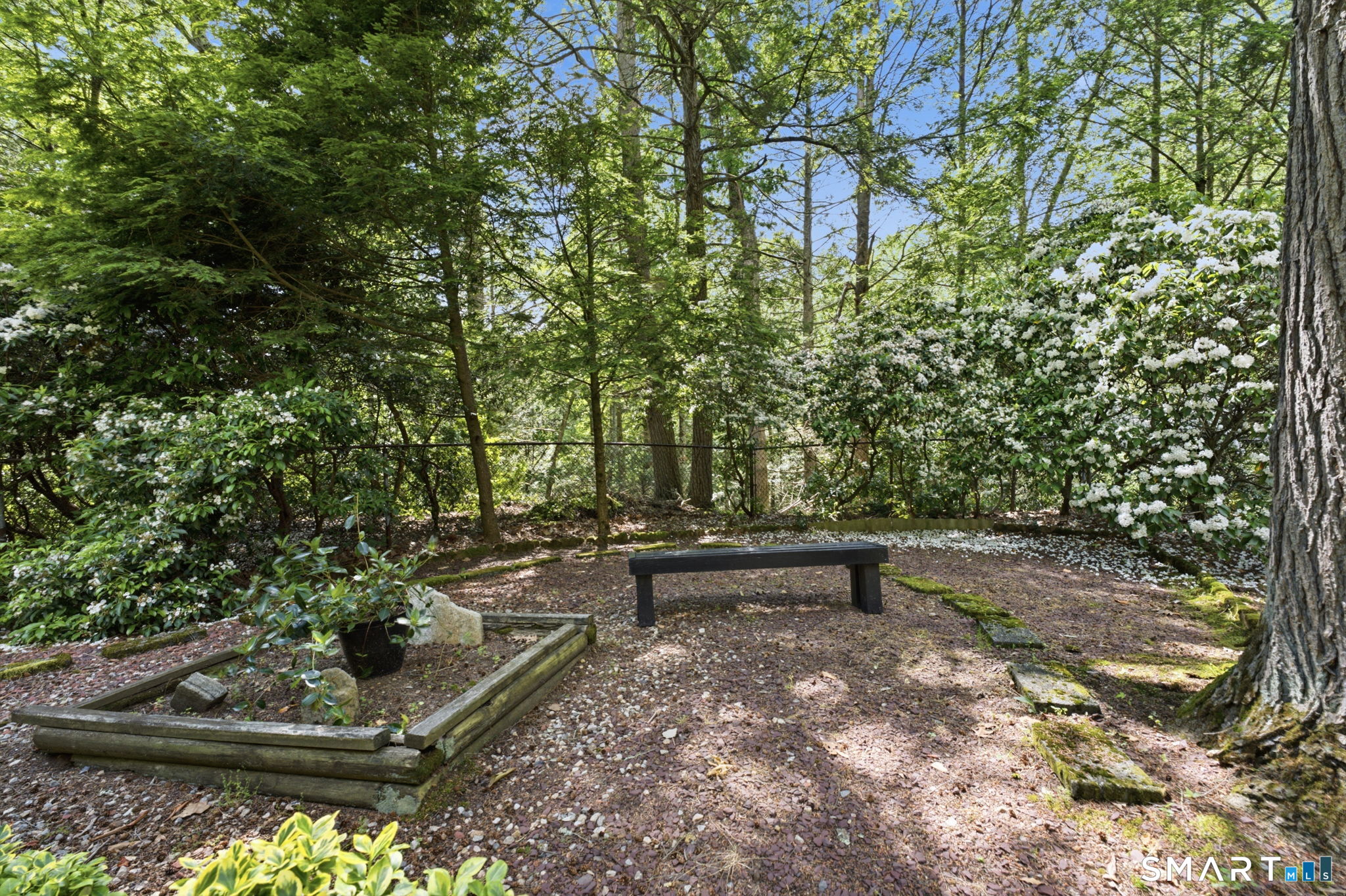 Tucked away in a peaceful wooded setting along the Blackledge River, t – image 35