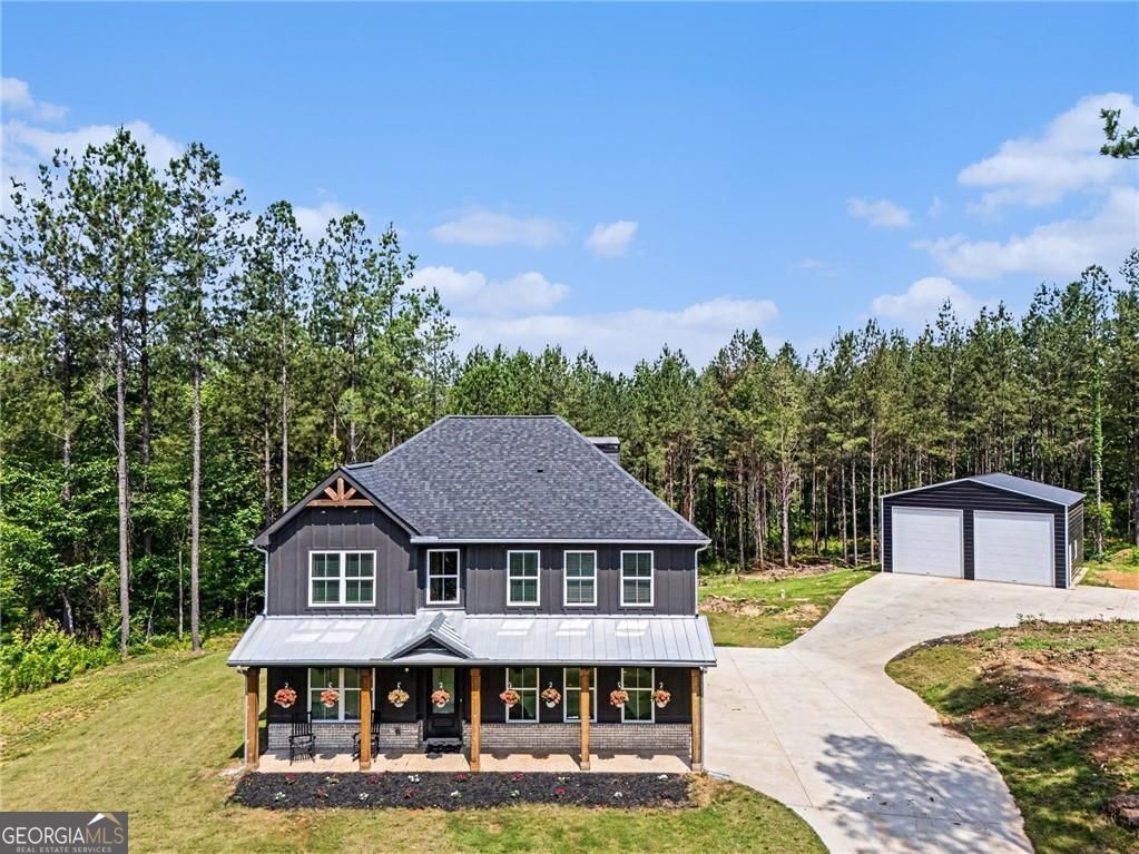 Nestled on 14.38 acres in the countryside, this beautiful 5-bedroom, 3 – image 3