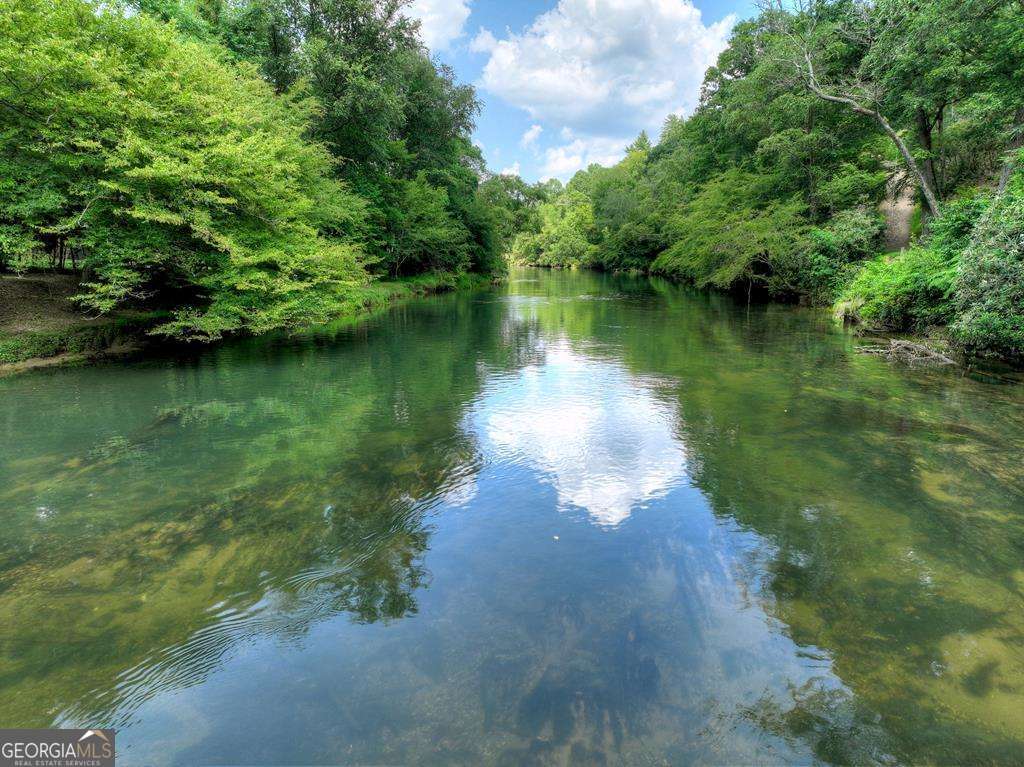 Welcome to your Private RIVERFRONT DREAM HOME on the shimmering shores – image 59