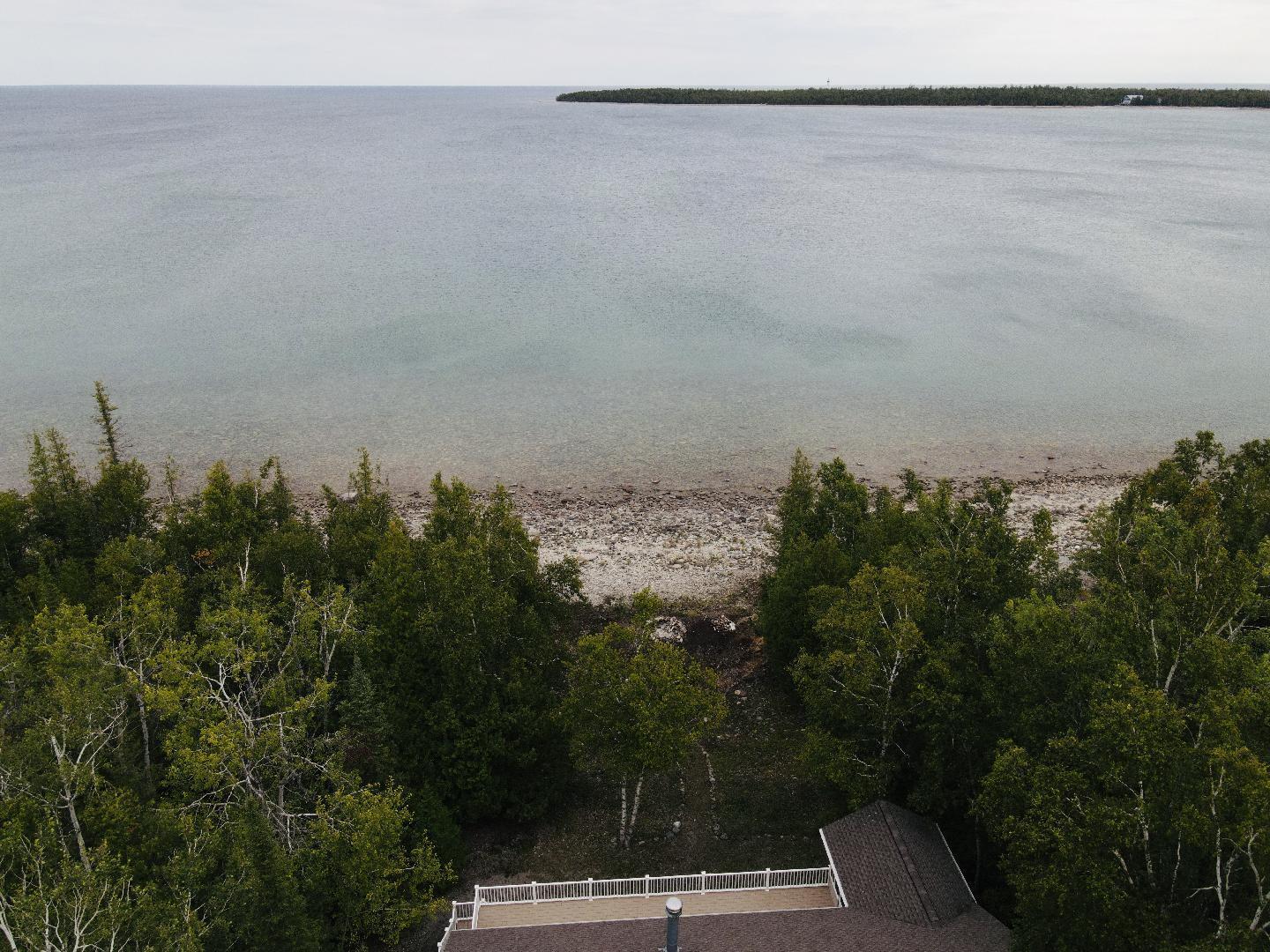 This one-owner ranch home on Lake Huron offers a perfect blend of comf – image 43