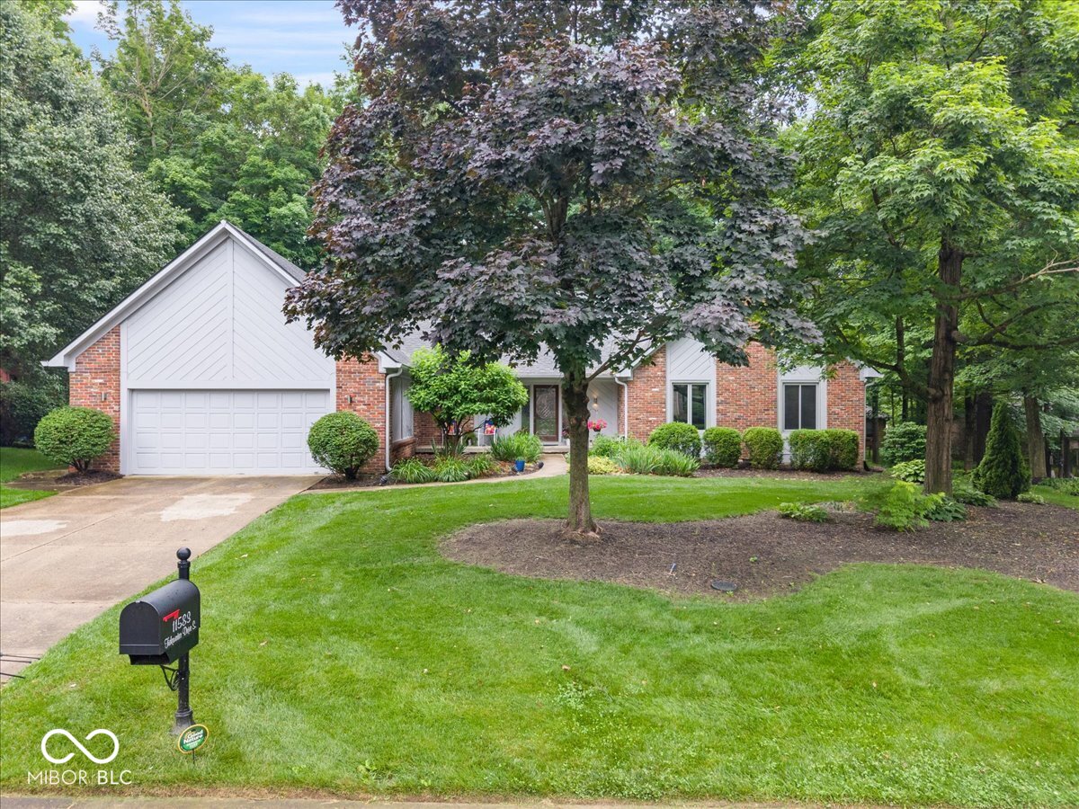 Updates galore in desirable Feather Cove III! Nestled on a half-acre w – image 1
