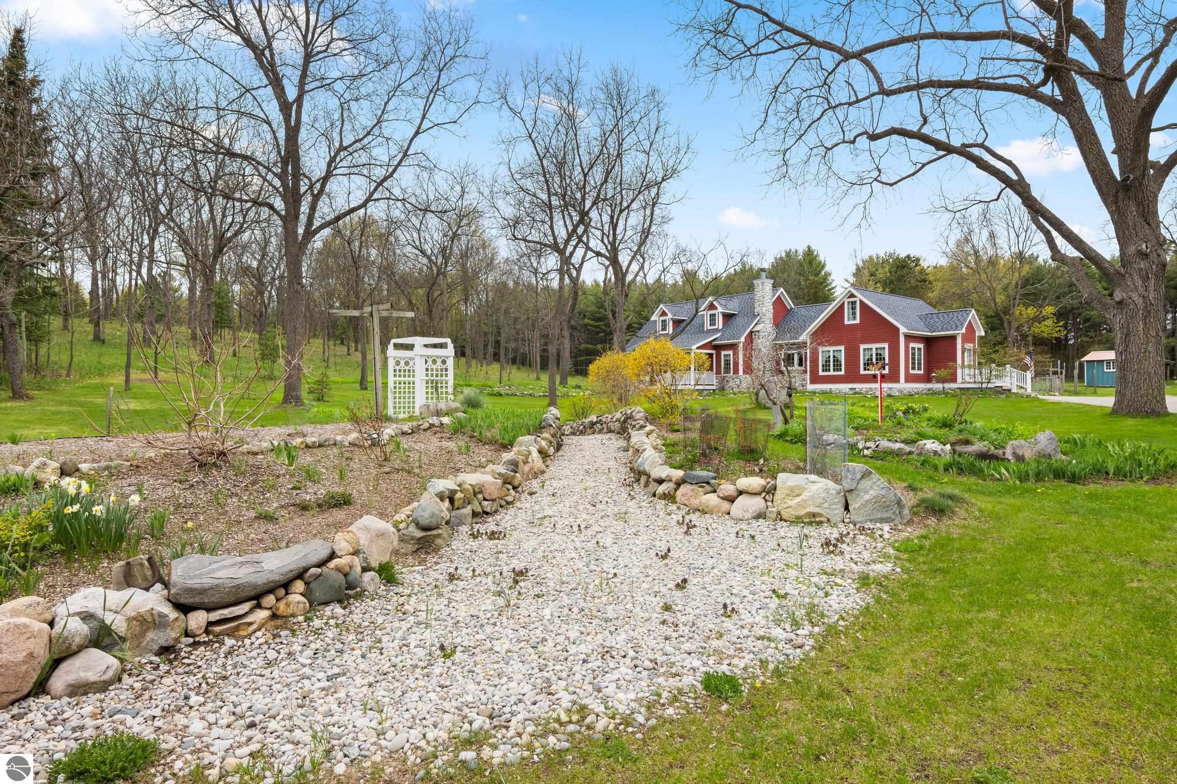 This 3-bedroom, 2.5-bath farmhouse offers a property designed for coun – image 52