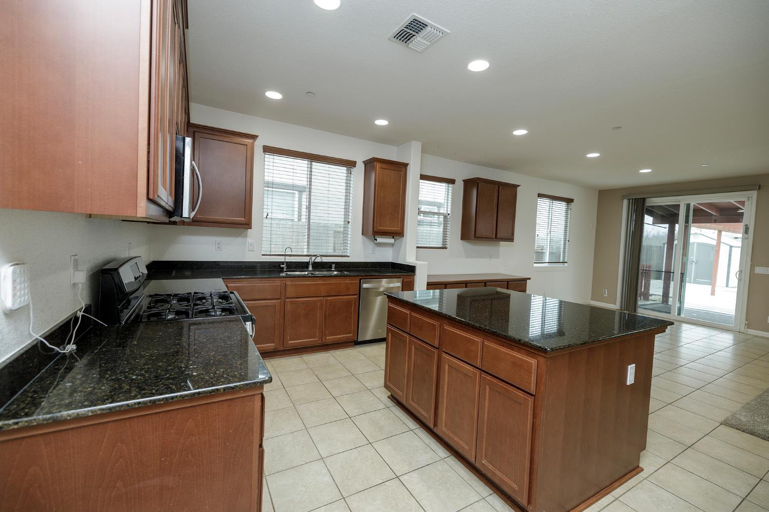 Located in a highly desirable neighborhood, this well-maintained home – image 10
