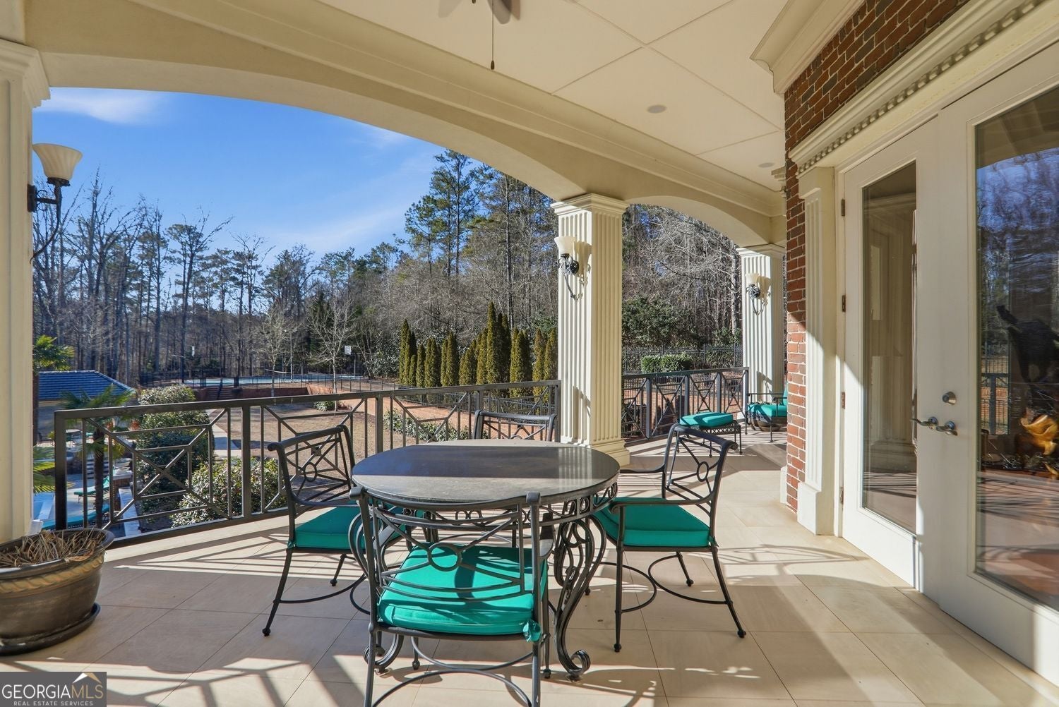 Set on 3.8 beautifully manicured acres, this elegant gated estate offe – image 149