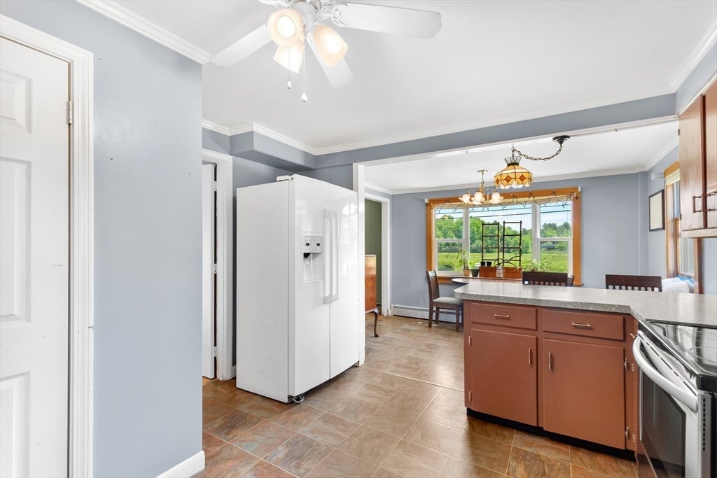 Nestled on over 2 acres, this Classic New England Cape offers the perf – image 6