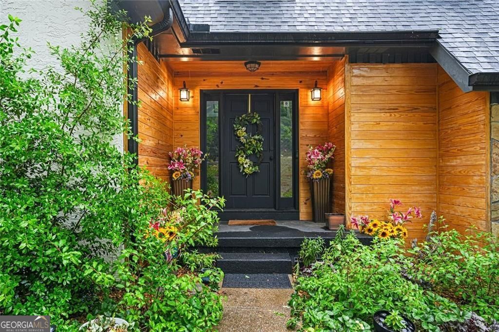 Welcome to 1229 Park Place Drive, a beautifully updated waterfront res – image 2