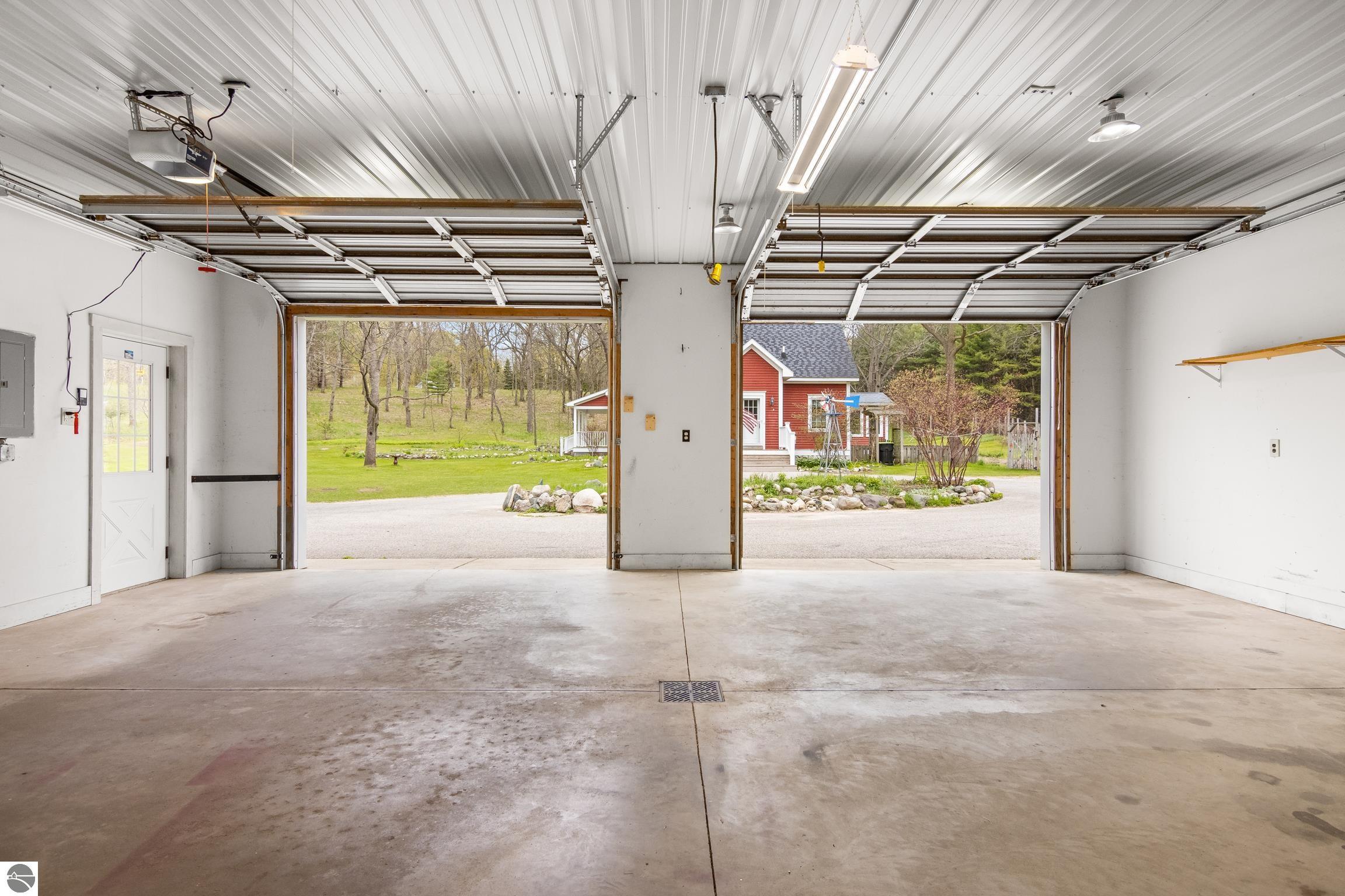 This 3-bedroom, 2.5-bath farmhouse offers a property designed for coun – image 58