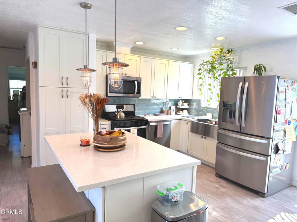 Fully Remodeled and move-in ready, this Single-Story attached Planned – image 2