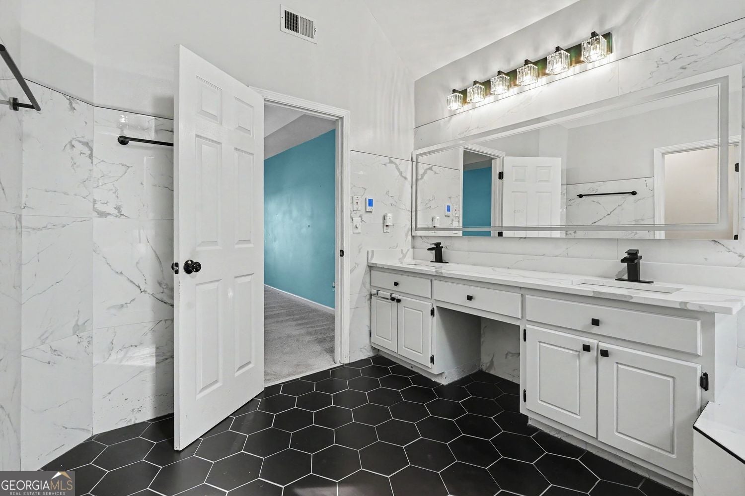 This beautifully updated home is loaded with upgrades and offers the p – image 34