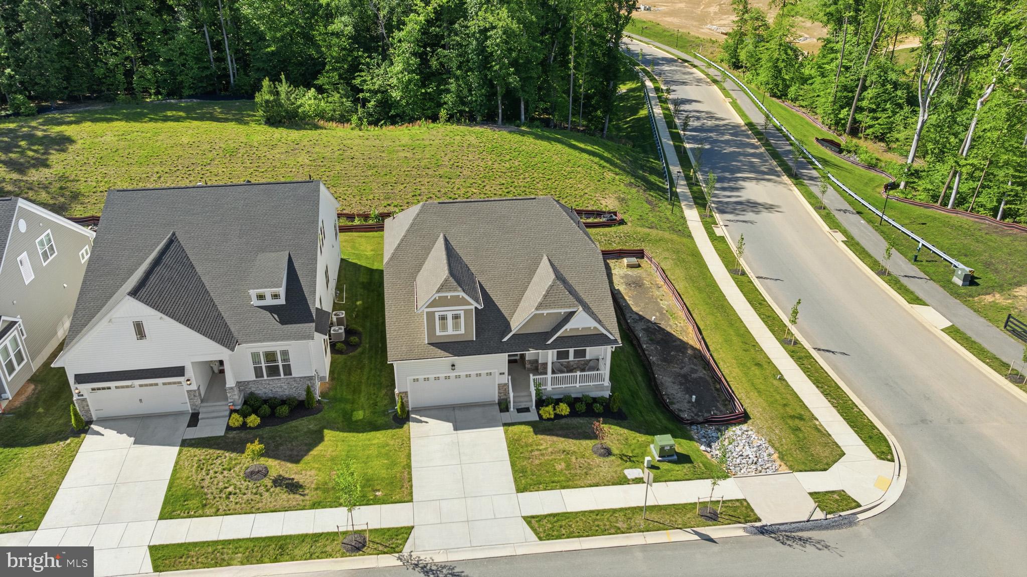 HOME SWEET HOME! Like new beauty situated on a corner lot, in sought – image 2