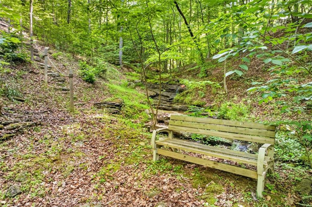 Fully furnished true log home on 5.78 private wooded acres in sought-a – image 47