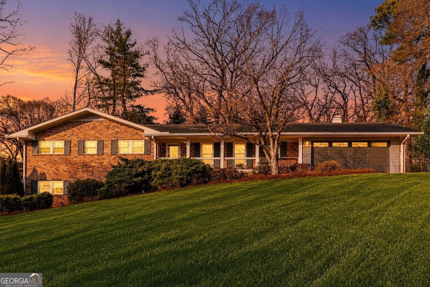 Beautifully updated and ideally located in the heart of Dunwoody, this – image 1