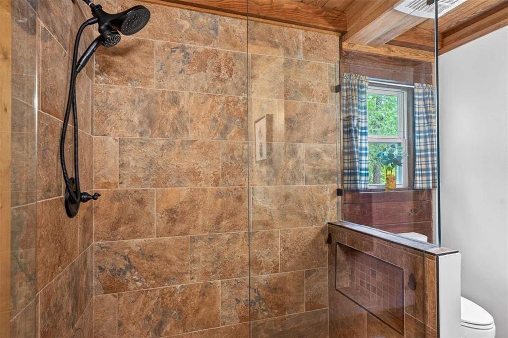 Fully furnished true log home on 5.78 private wooded acres in sought-a – image 19