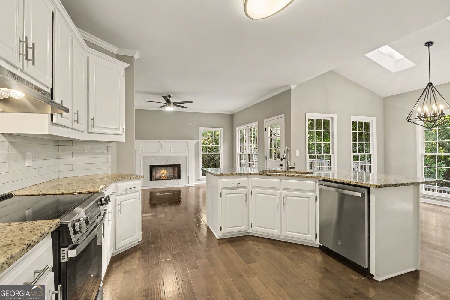 Welcome to a beautifully renovated home featuring a fully finished bas – image 10