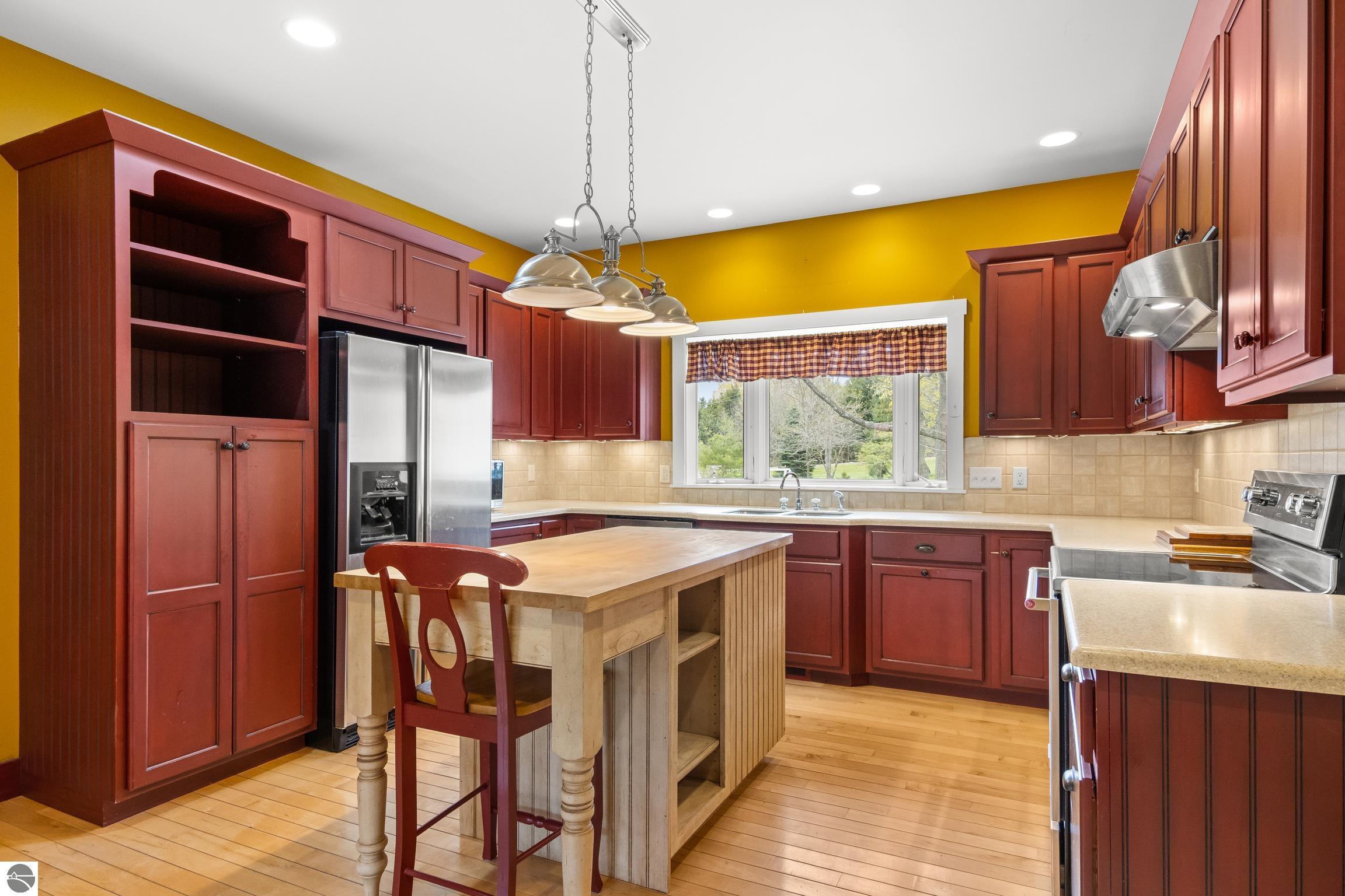 This 3-bedroom, 2.5-bath farmhouse offers a property designed for coun – image 12