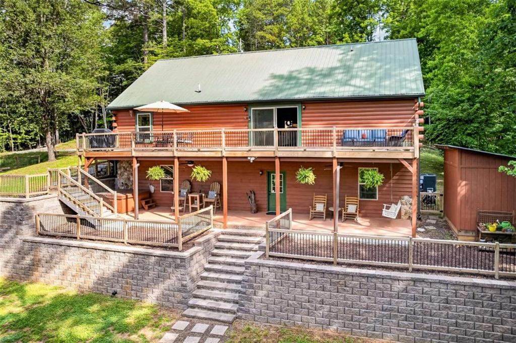 Fully furnished true log home on 5.78 private wooded acres in sought-a – image 42