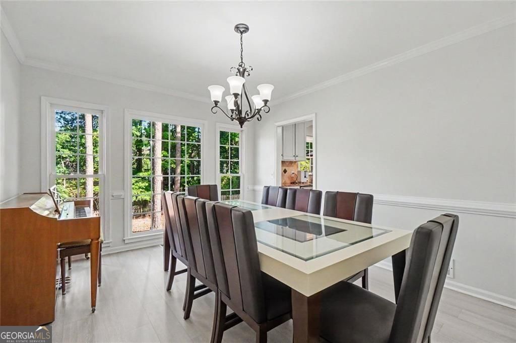 489 Broadstone Way in Brookstone III offers 7 bedrooms and 5 baths, in – image 3