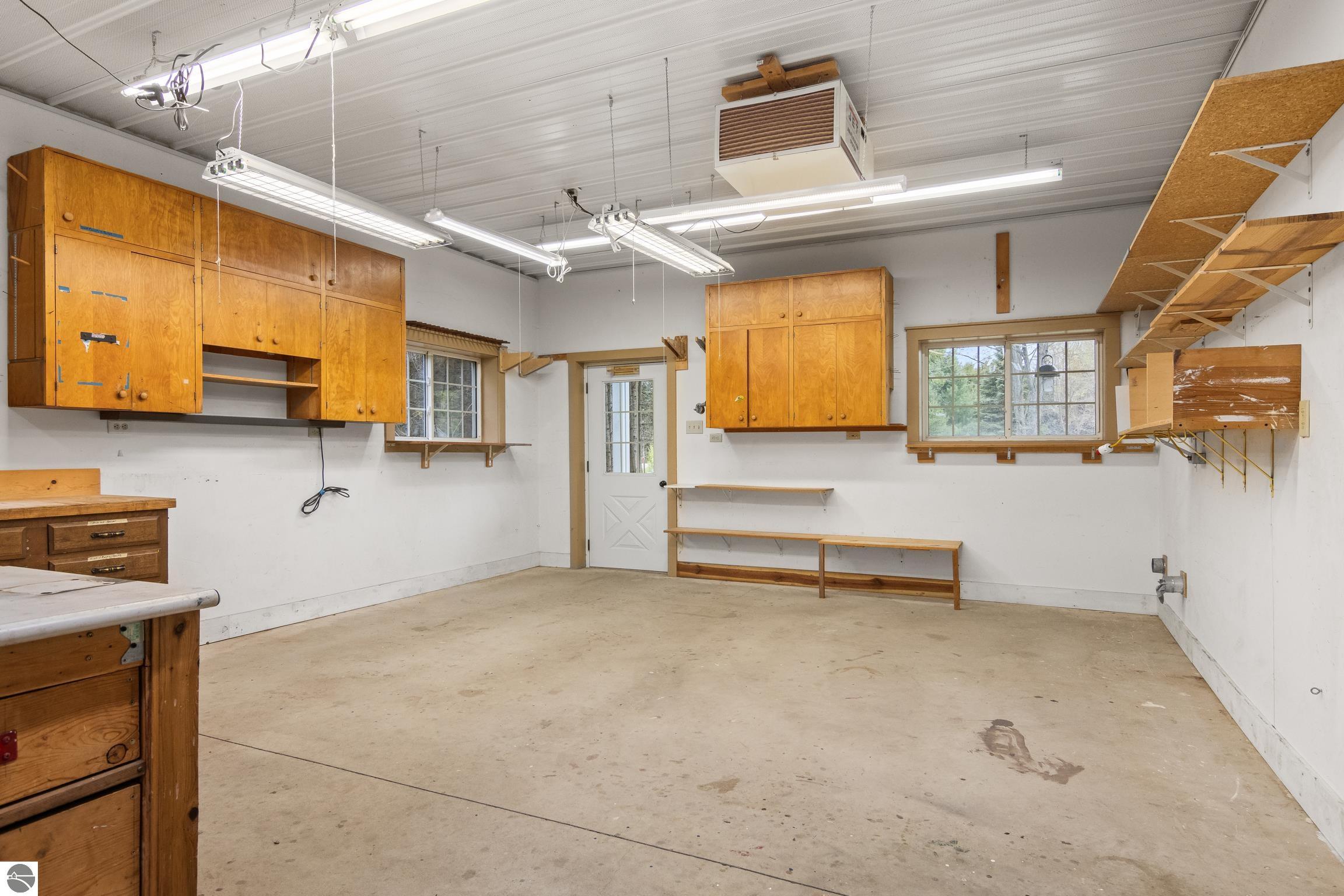 This 3-bedroom, 2.5-bath farmhouse offers a property designed for coun – image 66