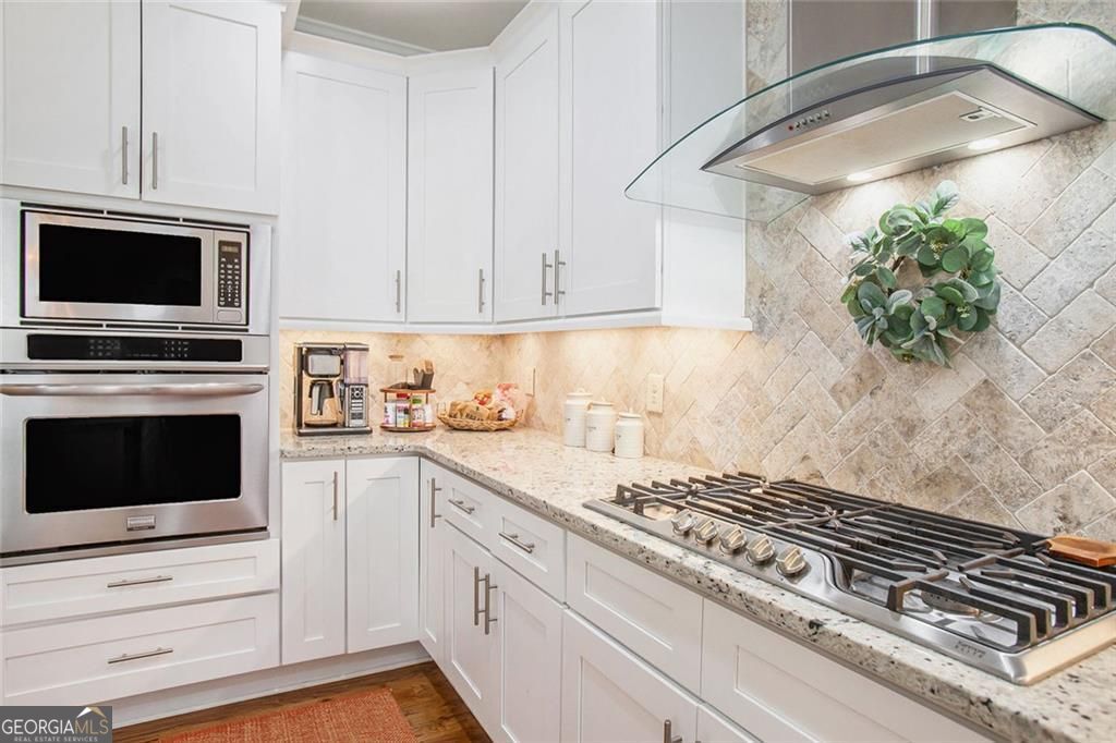 This exceptional two-story residence truly has it all, offering a perf – image 15