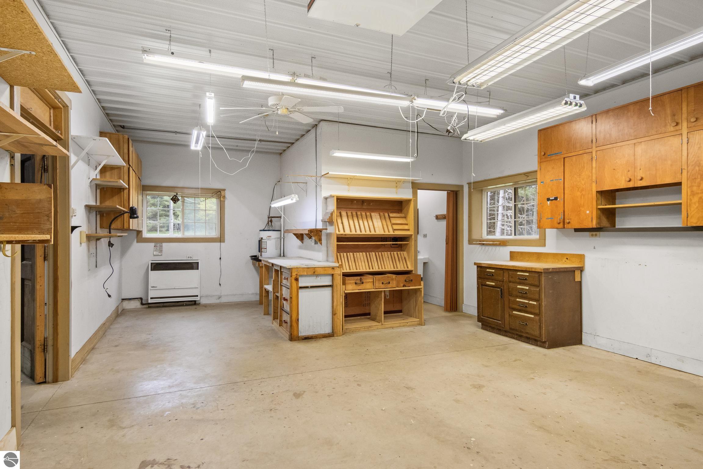 This 3-bedroom, 2.5-bath farmhouse offers a property designed for coun – image 64
