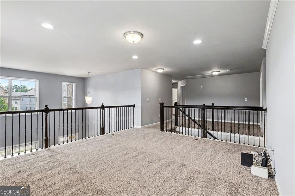 Location, location for this one, so close to the Mall of Georgia with – image 21