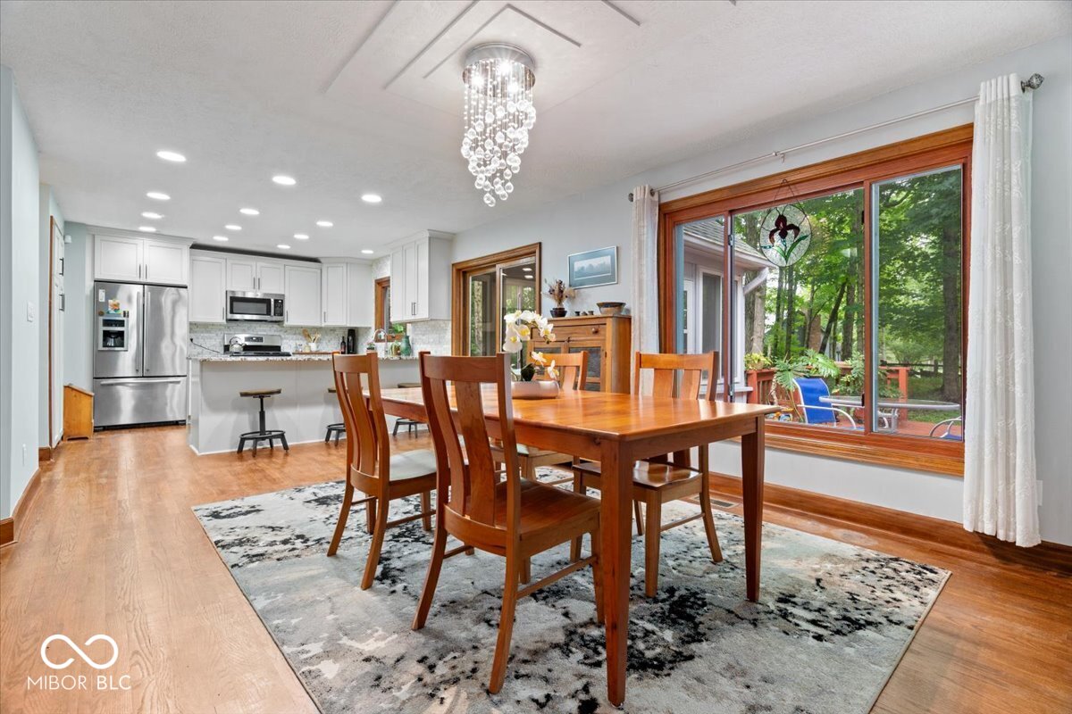 Updates galore in desirable Feather Cove III! Nestled on a half-acre w – image 11