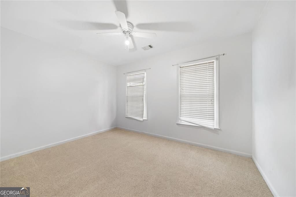 Just listed in the sought-after Arbors at Old Peachtree subdivision! T – image 34
