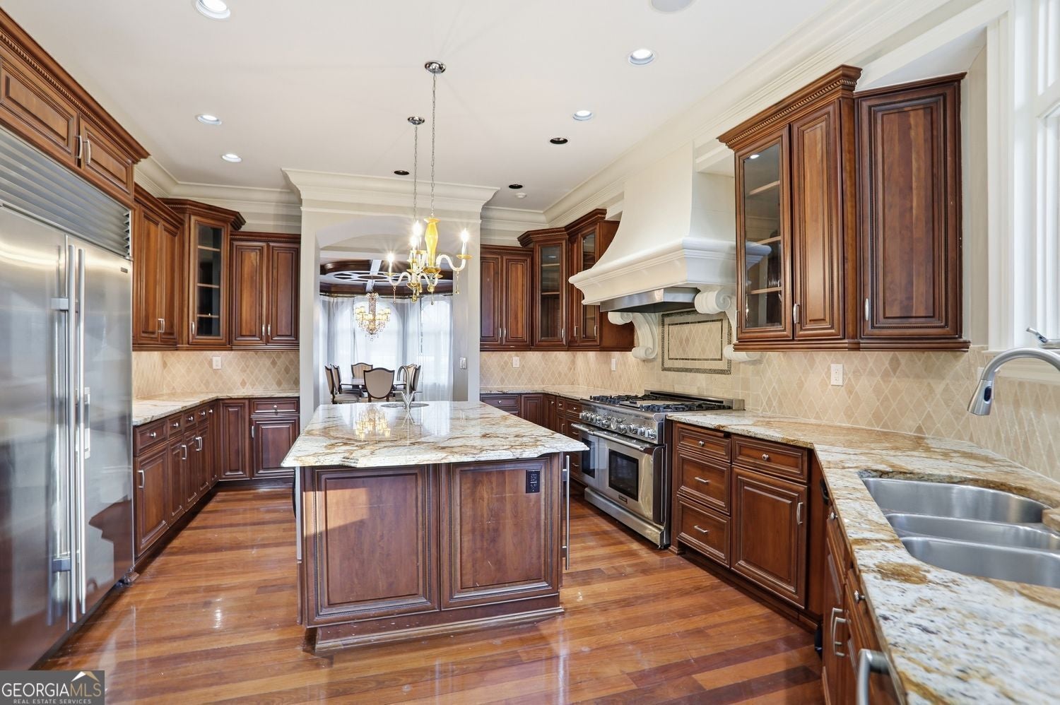 Set on 3.8 beautifully manicured acres, this elegant gated estate offe – image 89