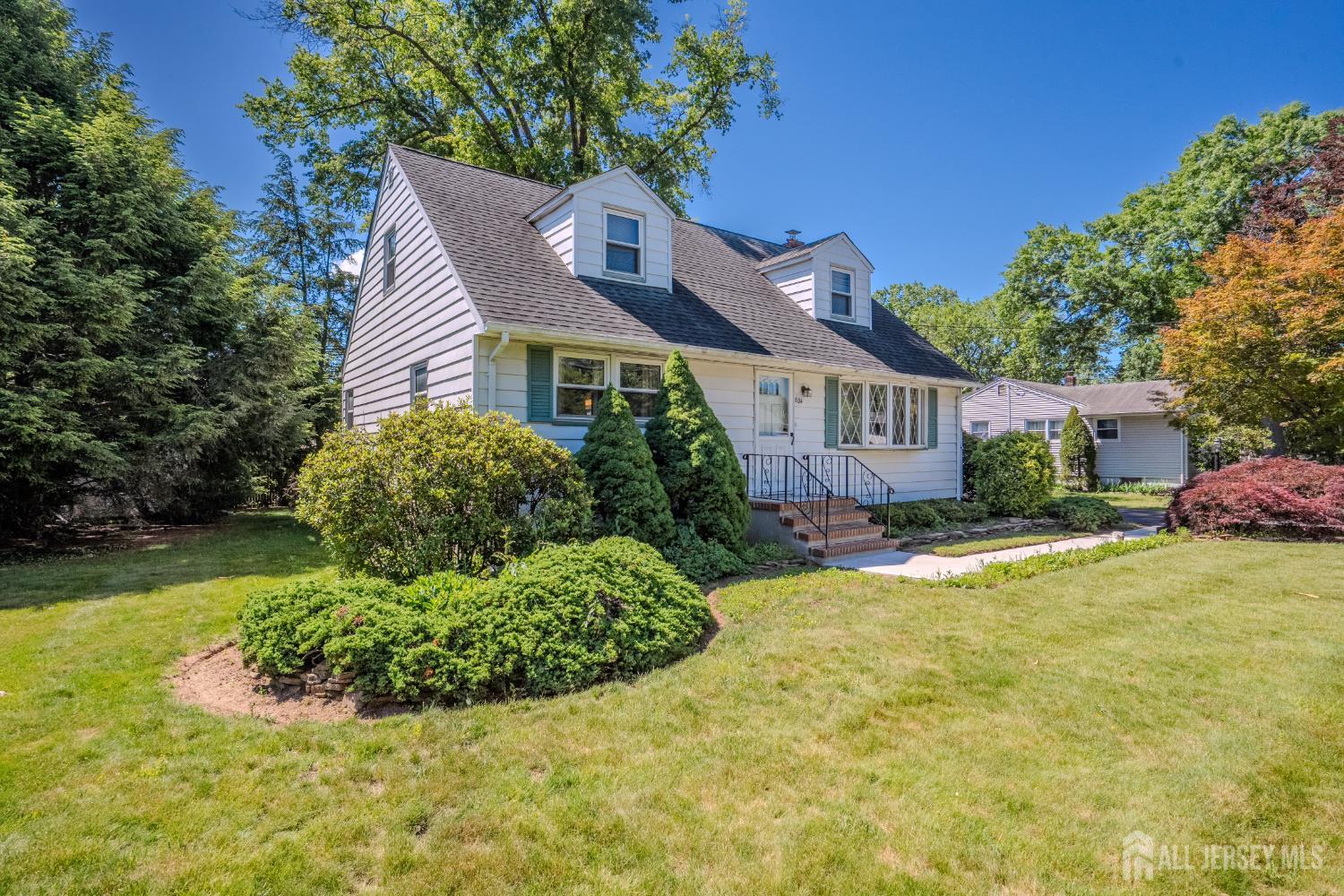 Welcome to 504 Plainfield Avenue, a charming Cape Cod home designed fo – image 35