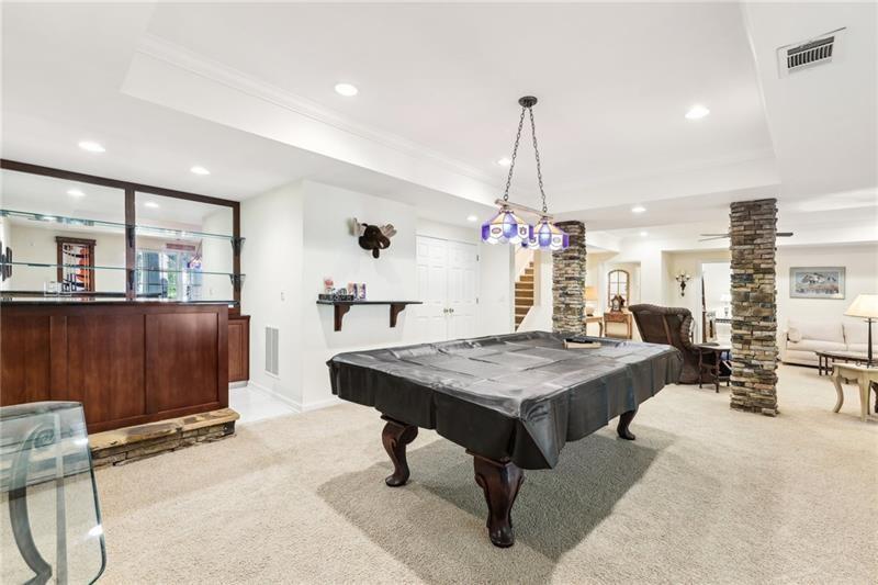 This beautiful home located on a cul-de-sac backs up to a private wood – image 46