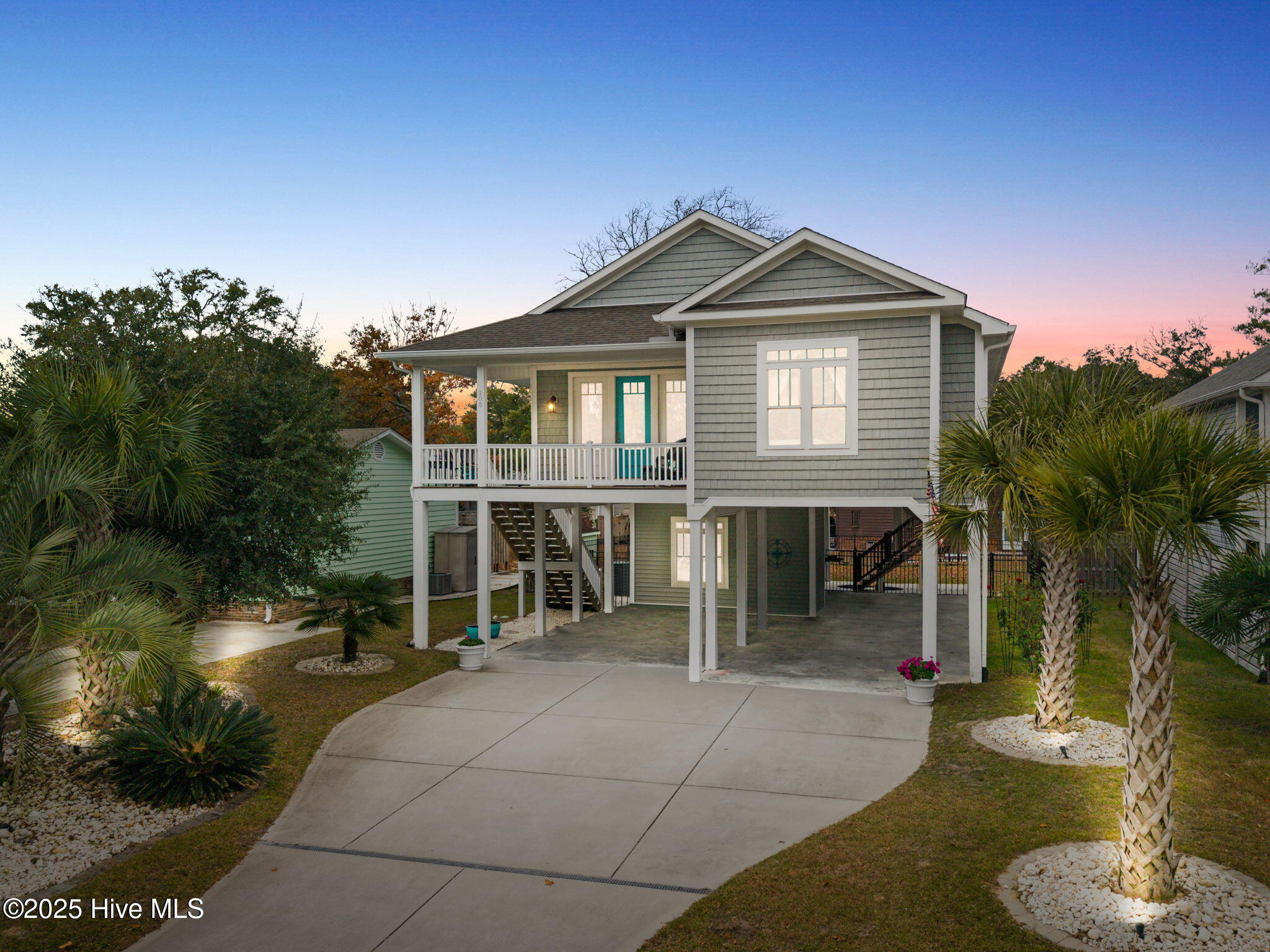 Welcome to 205 NE 59th Street, where coastal charm meets high-end craf – image 1