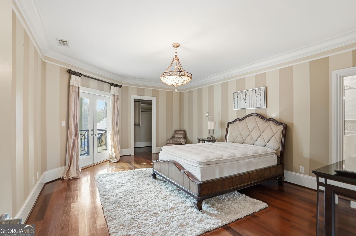 Set on 3.8 beautifully manicured acres, this elegant gated estate offe – image 116