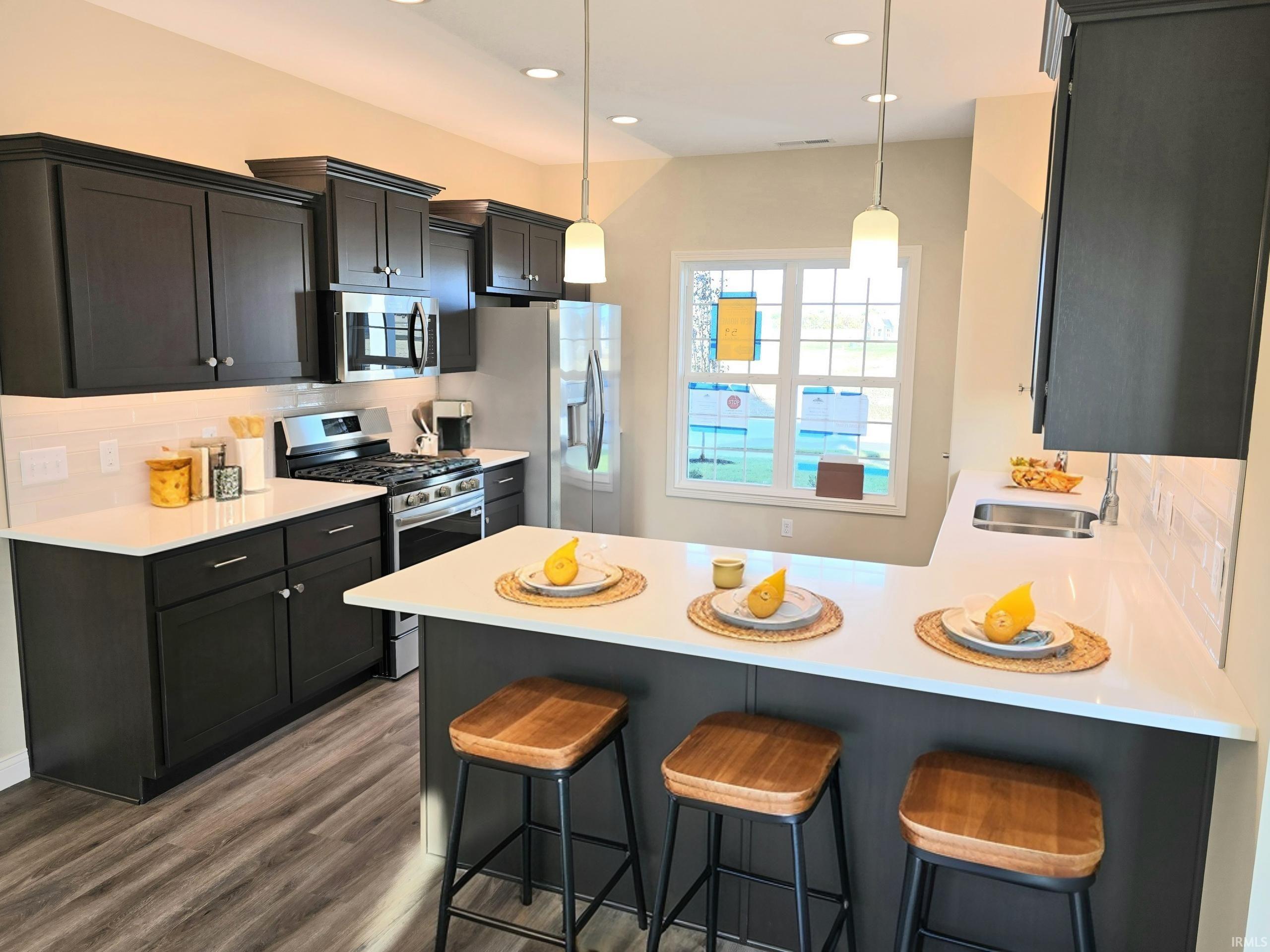 The Cimarron by Majestic Homes offers 2,566 sq/ft of living space and – image 5