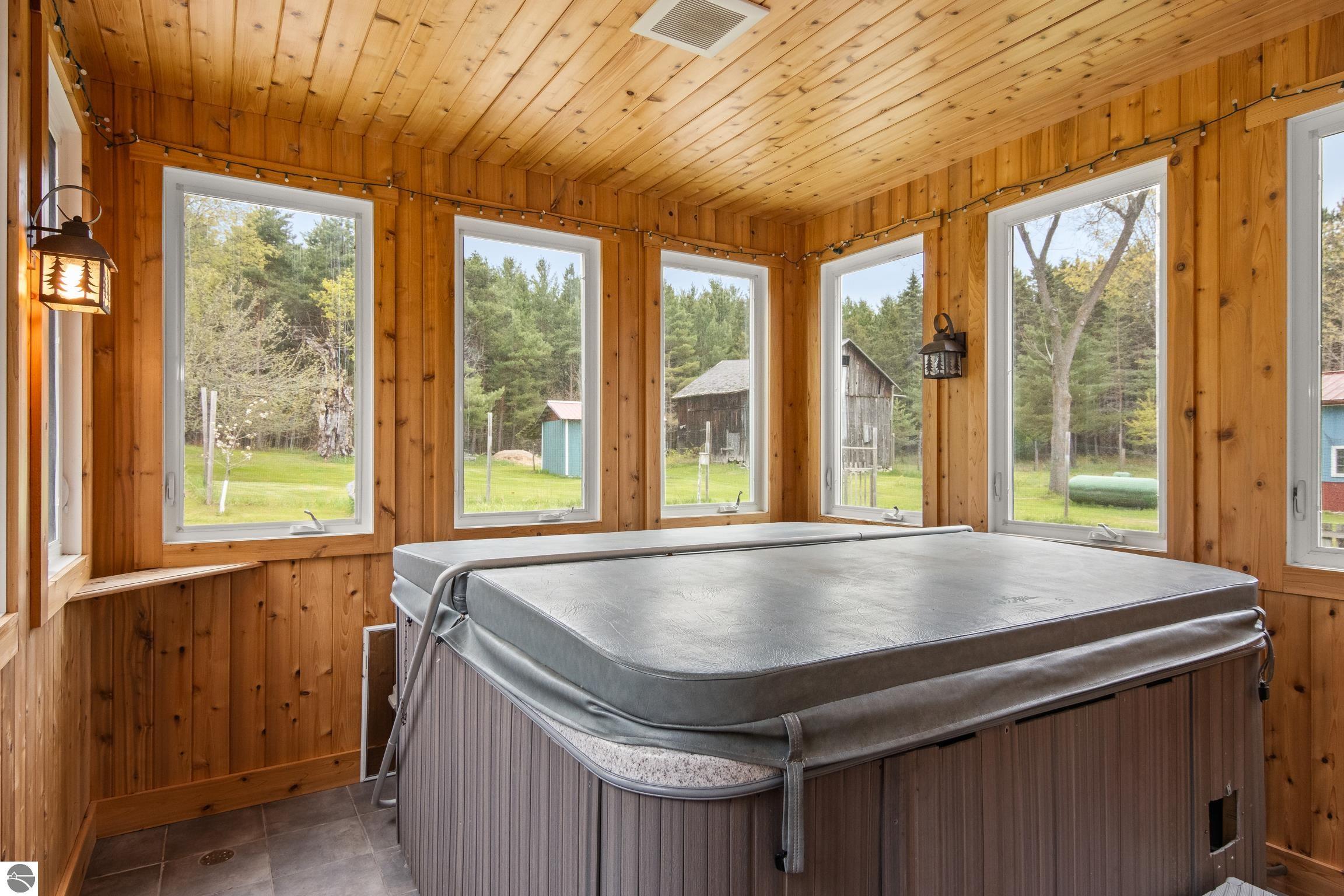 This 3-bedroom, 2.5-bath farmhouse offers a property designed for coun – image 43