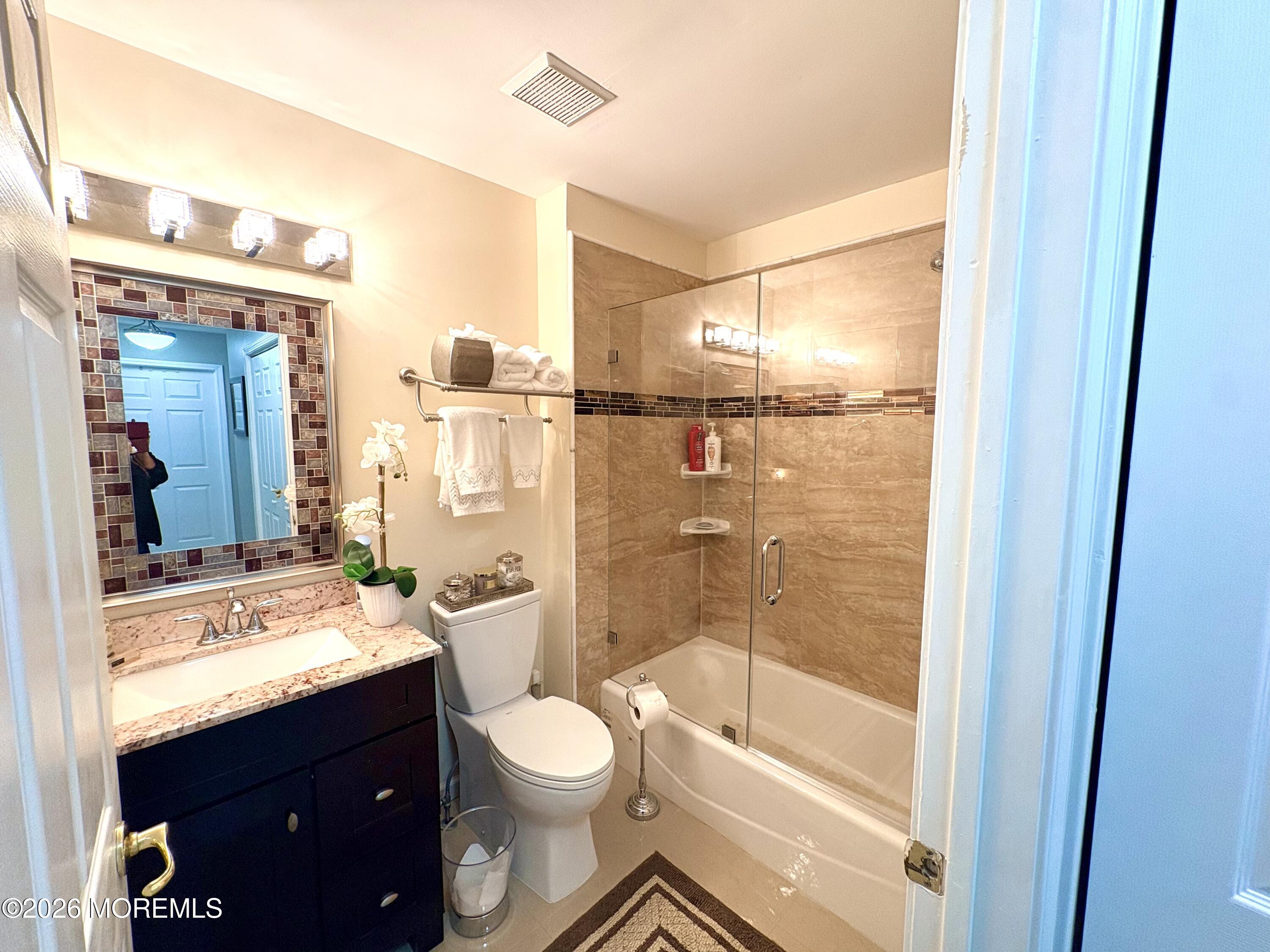No expense spared in this impeccably upgraded home in the sought-after – image 16