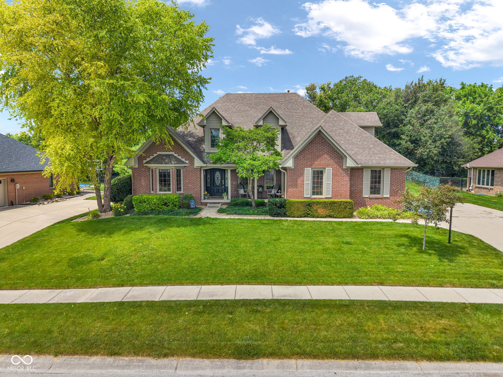 Step inside and instantly feel at home in this custom brick Cape Cod n – image 2