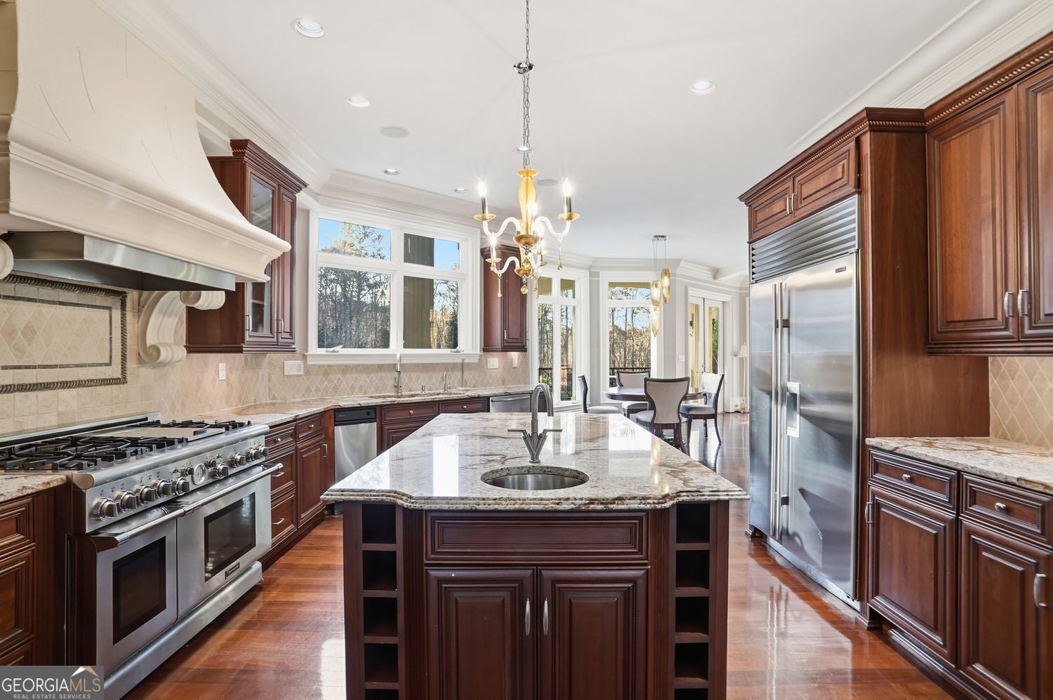 Set on 3.8 beautifully manicured acres, this elegant gated estate offe – image 87