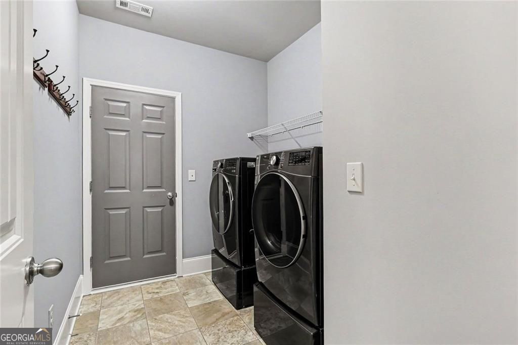 Location, location for this one, so close to the Mall of Georgia with – image 20