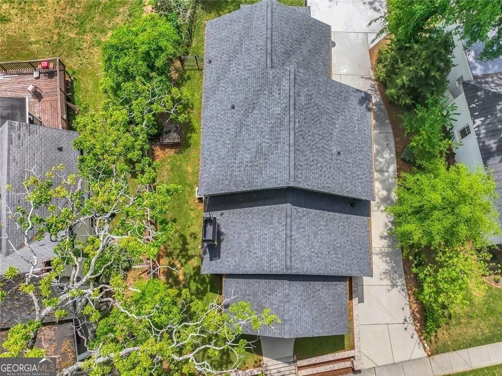 Freshly repositioned below $550K, this newer-construction Stone Mounta – image 40