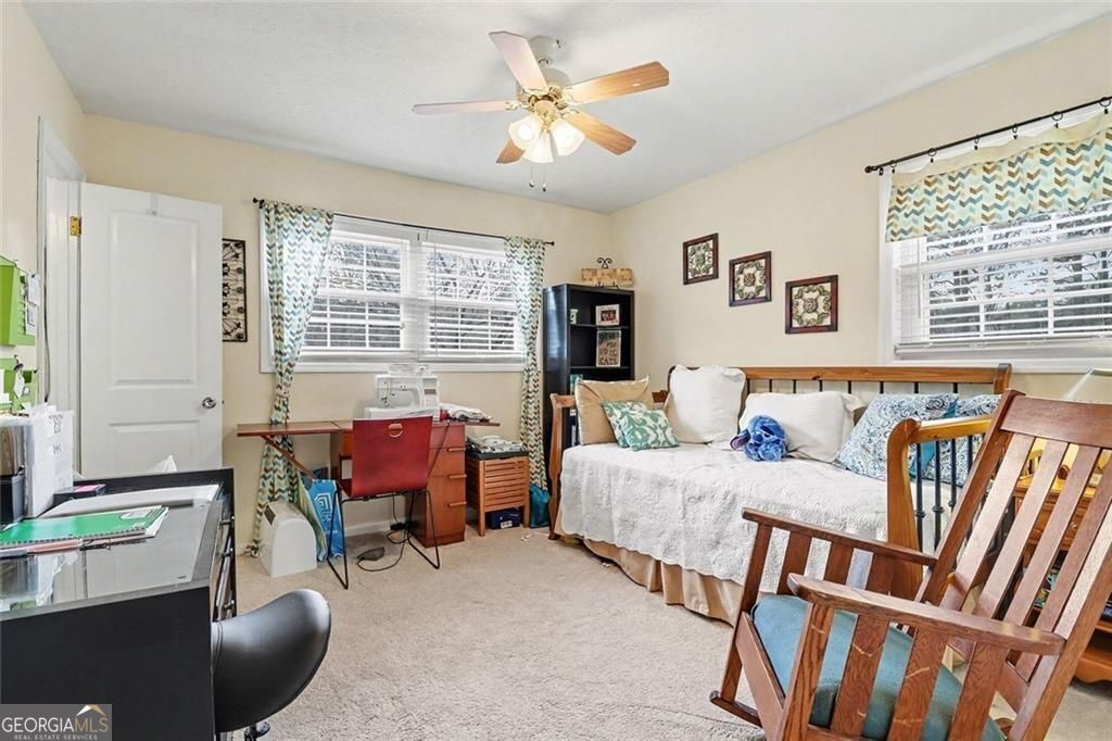 Beautifully updated and ideally located in the heart of Dunwoody, this – image 22