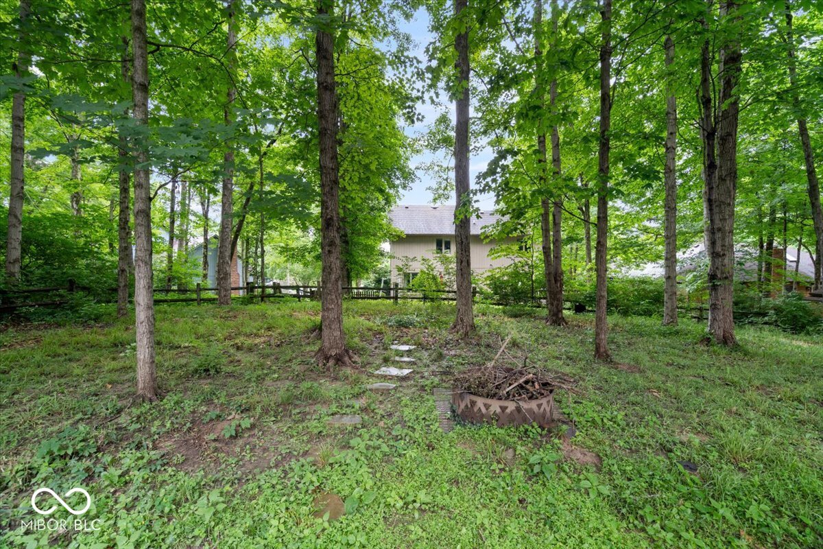 Updates galore in desirable Feather Cove III! Nestled on a half-acre w – image 36