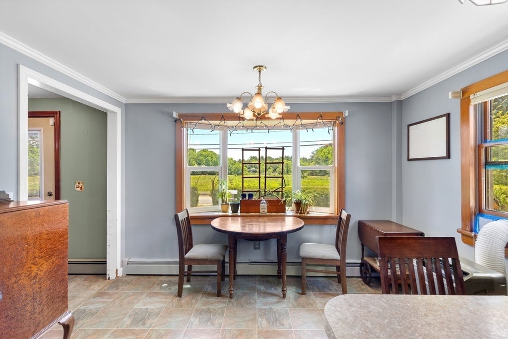 Nestled on over 2 acres, this Classic New England Cape offers the perf – image 13