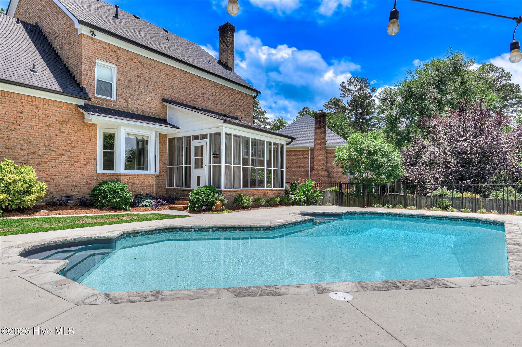 Welcome to this stunning brick home nestled on a quiet cul-de-sac in t – image 63